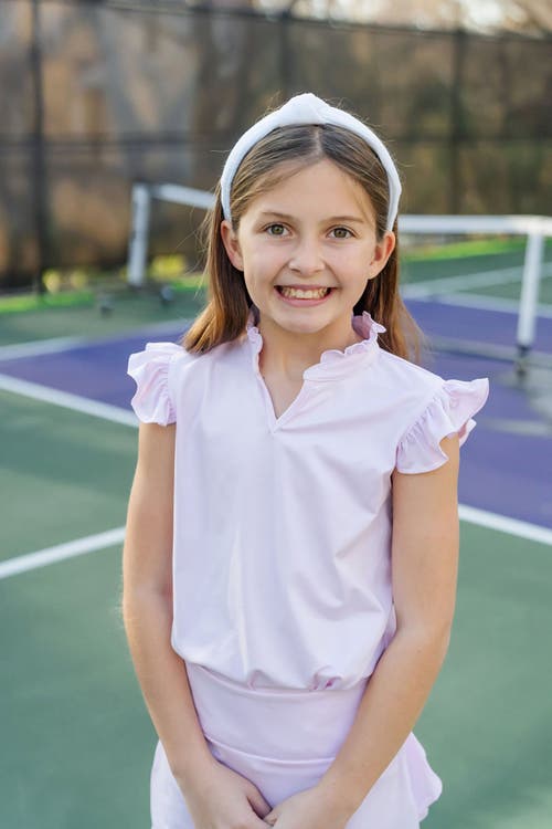 LILA AND HAYES LILA AND HAYES ELLIE GIRLS' SLEEVELESS RUFFLED TOP BY LH SPORT 
