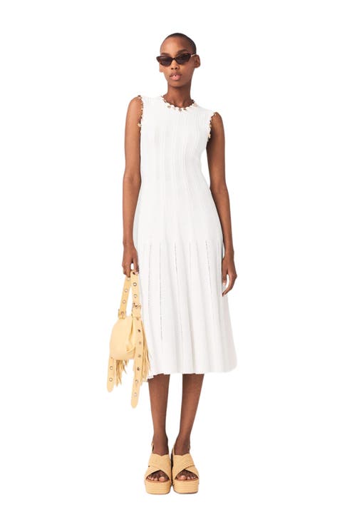 Knit dress with gold jewellery