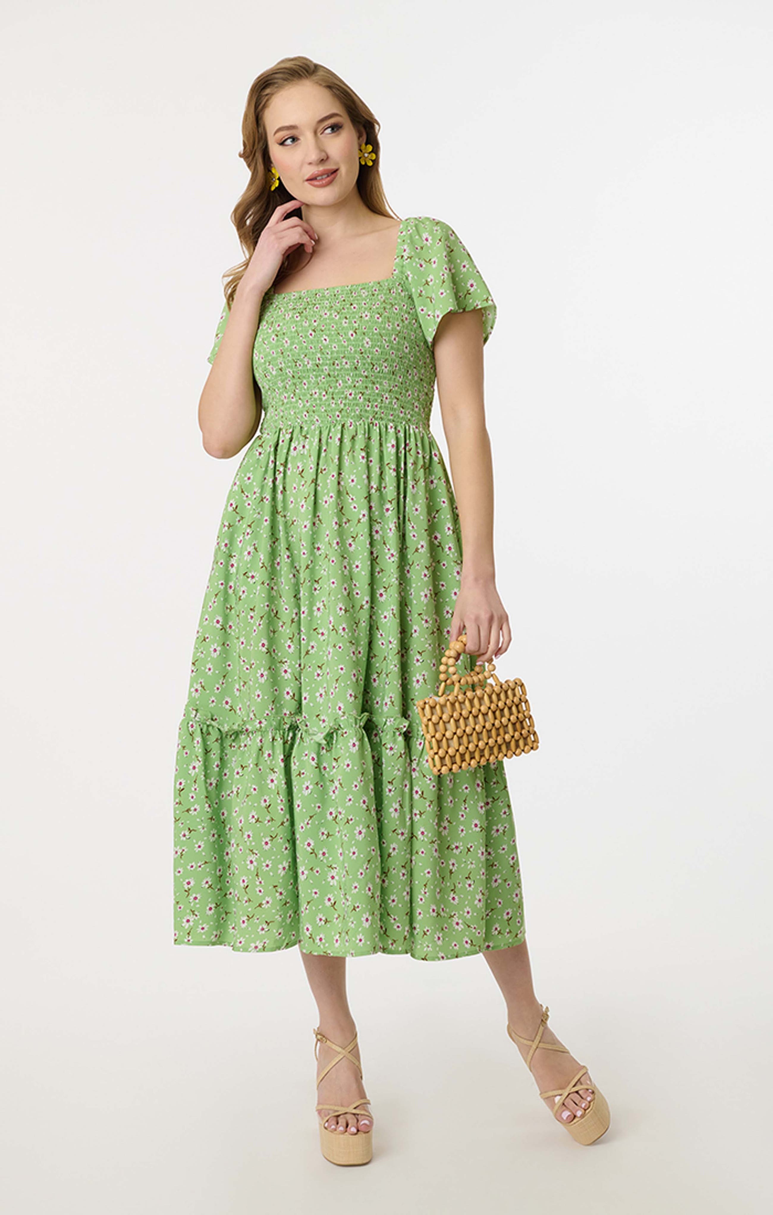 Unique Vintage smocked bodice flutter-sleeve midi dress with pockets