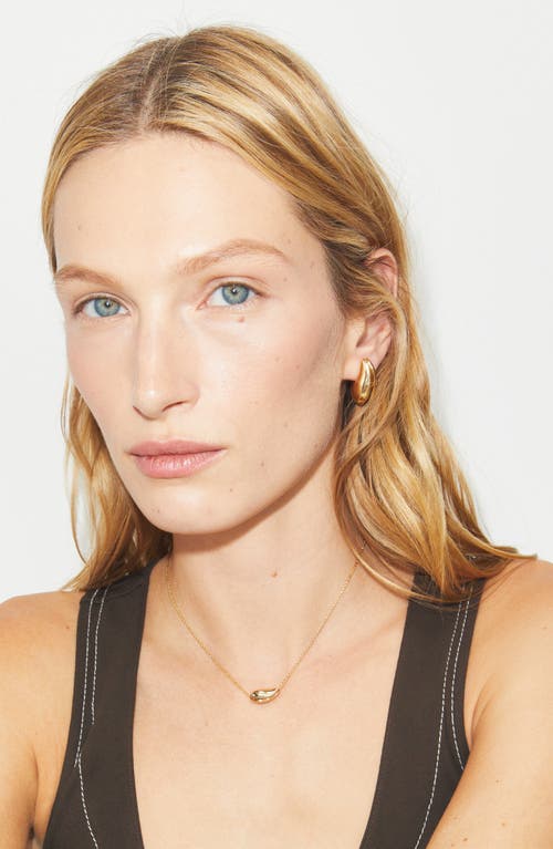 Tory Burch Wave Pendant Necklace In Gold