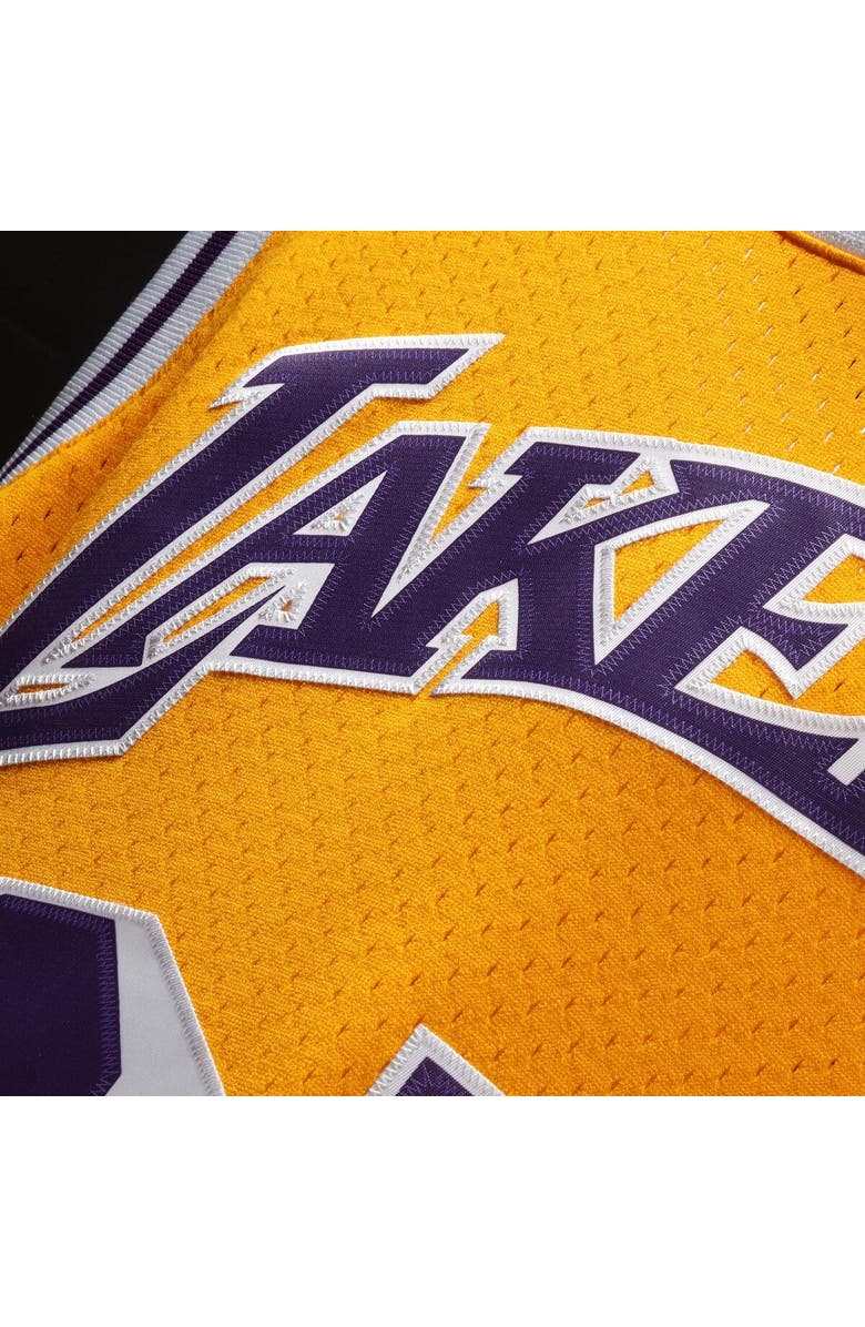 Mitchell & Ness Men's Mitchell & Ness Magic Johnson Gold Los Angeles Lakers 1984/85 Hardwood Classics Swingman Jersey, Alternate, color, Gold