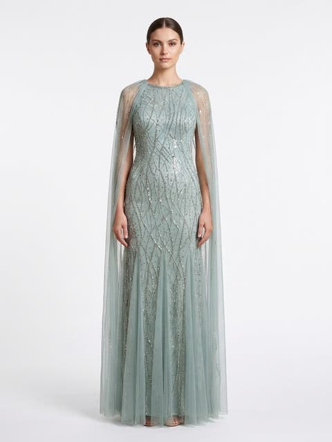 Elegant Beaded Dress with Long Cape