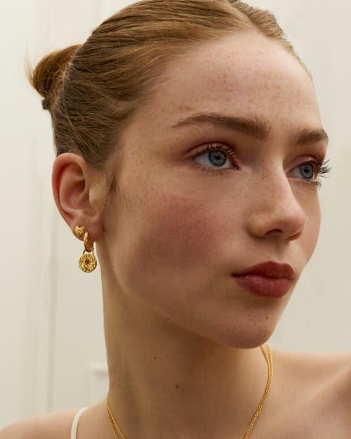 Ottoman Hands Garnet Heart Huggie Earrings In Gold