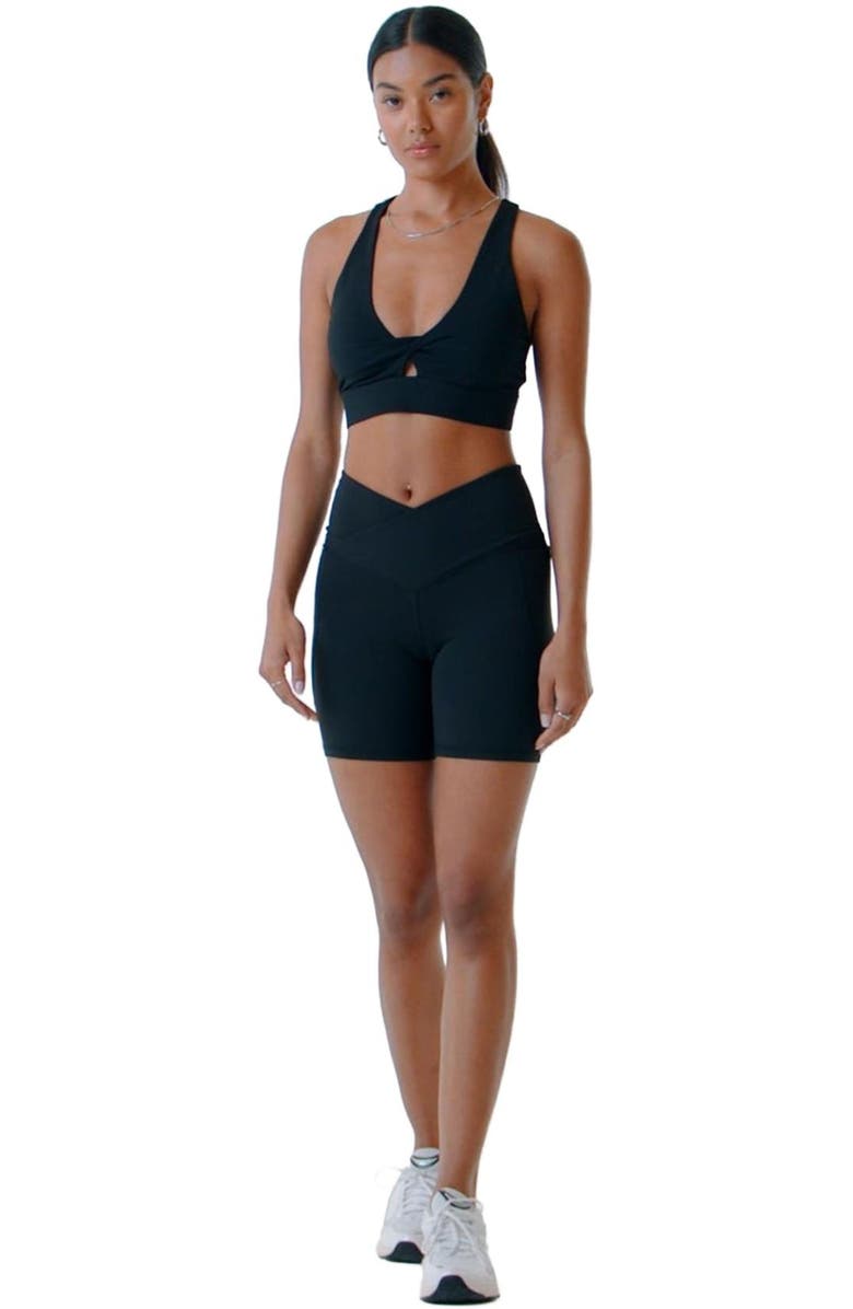 Fabletics Women's Oasis Twist Medium Impact Sports Bra, Alternate, color, Black