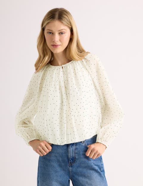 Flocked Spot Bubble Hem Blouse