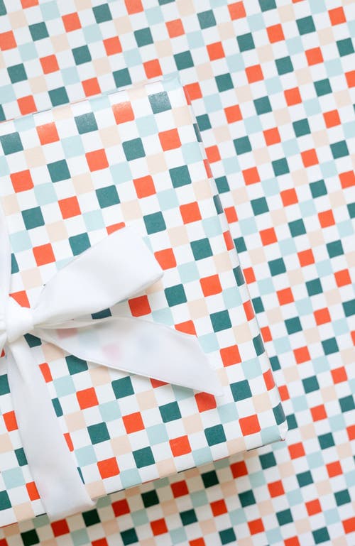Joy Paper Co. Holiday Checkered Wrapping Paper In Checkered Coral, Teal