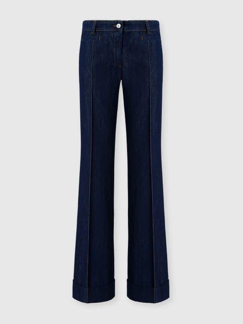 Flared Denim Trousers With Turn-up Hem And Center Crease