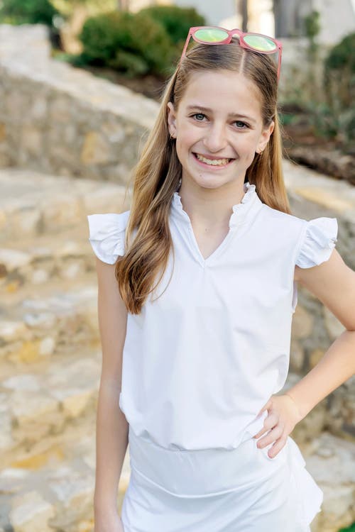 LILA AND HAYES LILA AND HAYES ELLIE GIRLS' SLEEVELESS RUFFLED TOP BY LH SPORT 