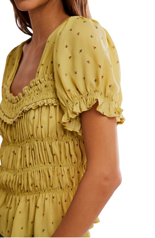Free People Adore You Ruffle Puff Sleeve Peplum Top In Yellow