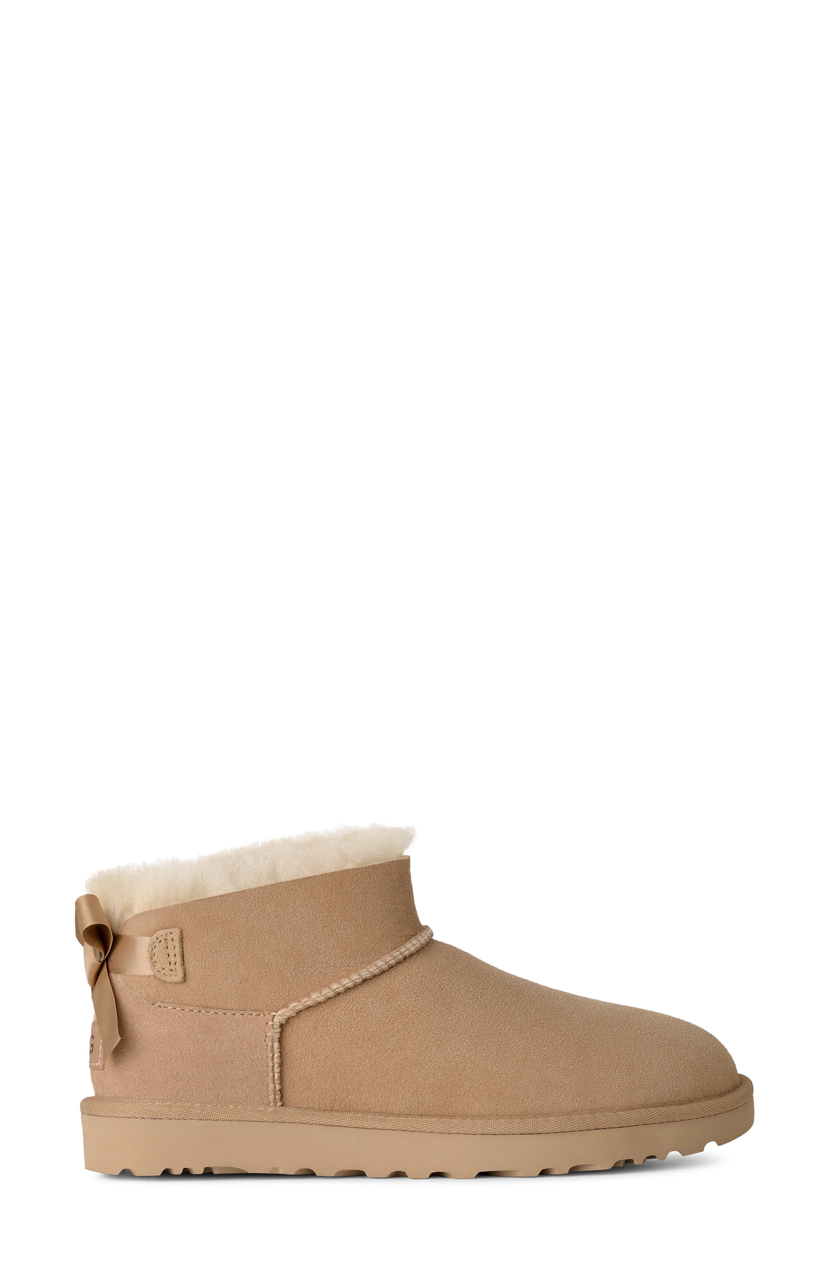Ultra Mini Bailey Bow Genuine Shearling Boot, Alternate, color, SAND