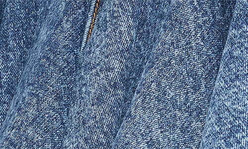 Alaïa Denim Skater Miniskirt In Bleu Neige