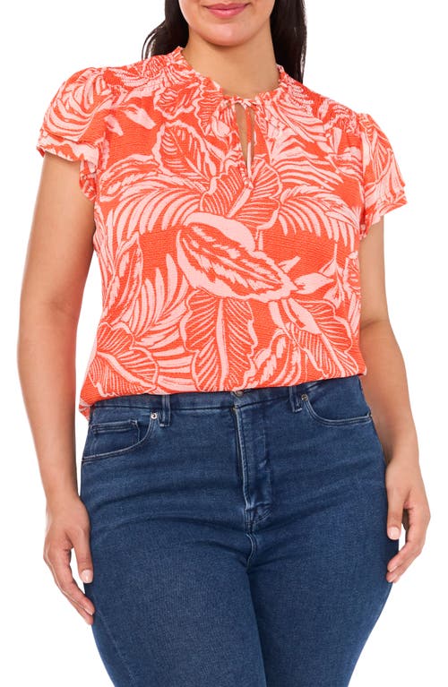 Cece Smocked Tie Neck Flutter Sleeve Top In Orange