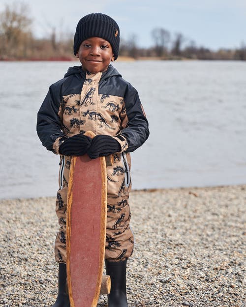 DEUX PAR DEUX DEUX PAR DEUX LITTLE BOY'S PRINTED MID-SEASON ONE-PIECE OUTERWEAR BLACK DINOSAUR ON BEIGE BACKGROUND