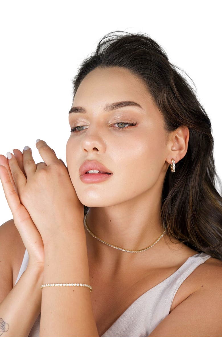 Hollywood Sensation Radiant Glamour Huggie Hoop Earrings Embellished with Sparkling Cubic Zirconia, Alternate, color, Gold