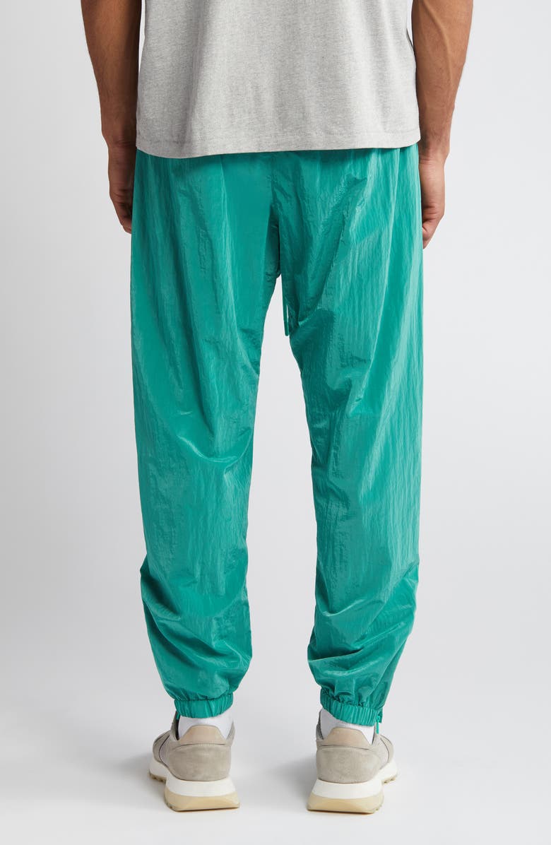 Fear of God Essentials Stretch Nylon Track Pants, Alternate, color,