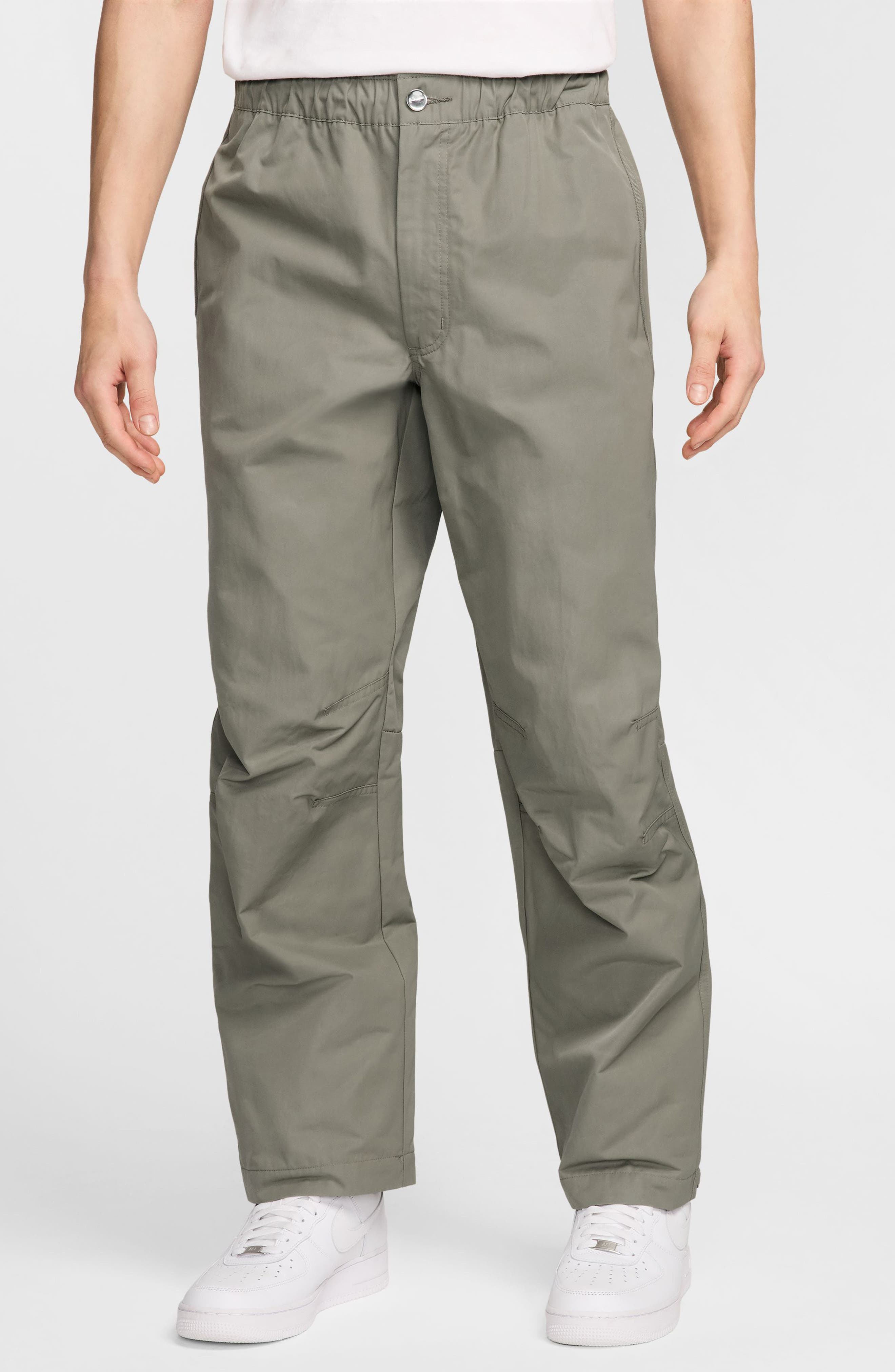 NIKE NIKE TECH WOVEN FLAT FRONT PANTS