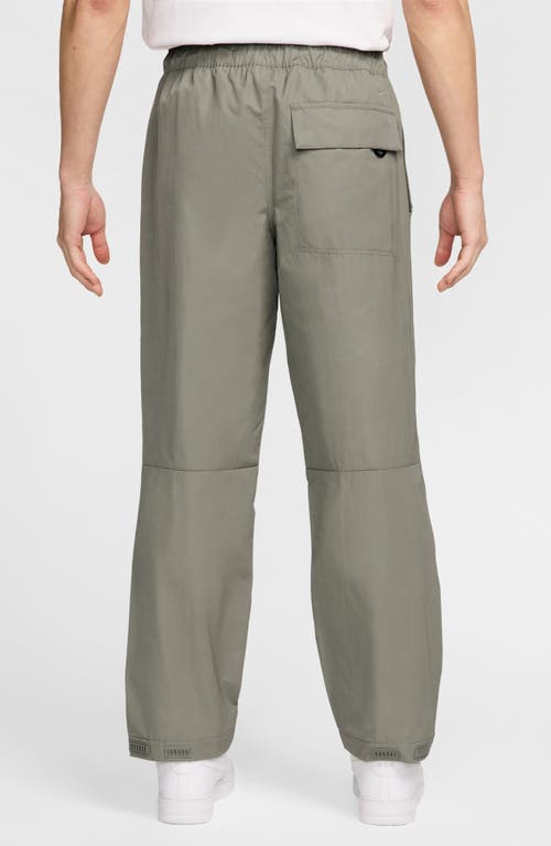 NIKE NIKE TECH WOVEN FLAT FRONT PANTS