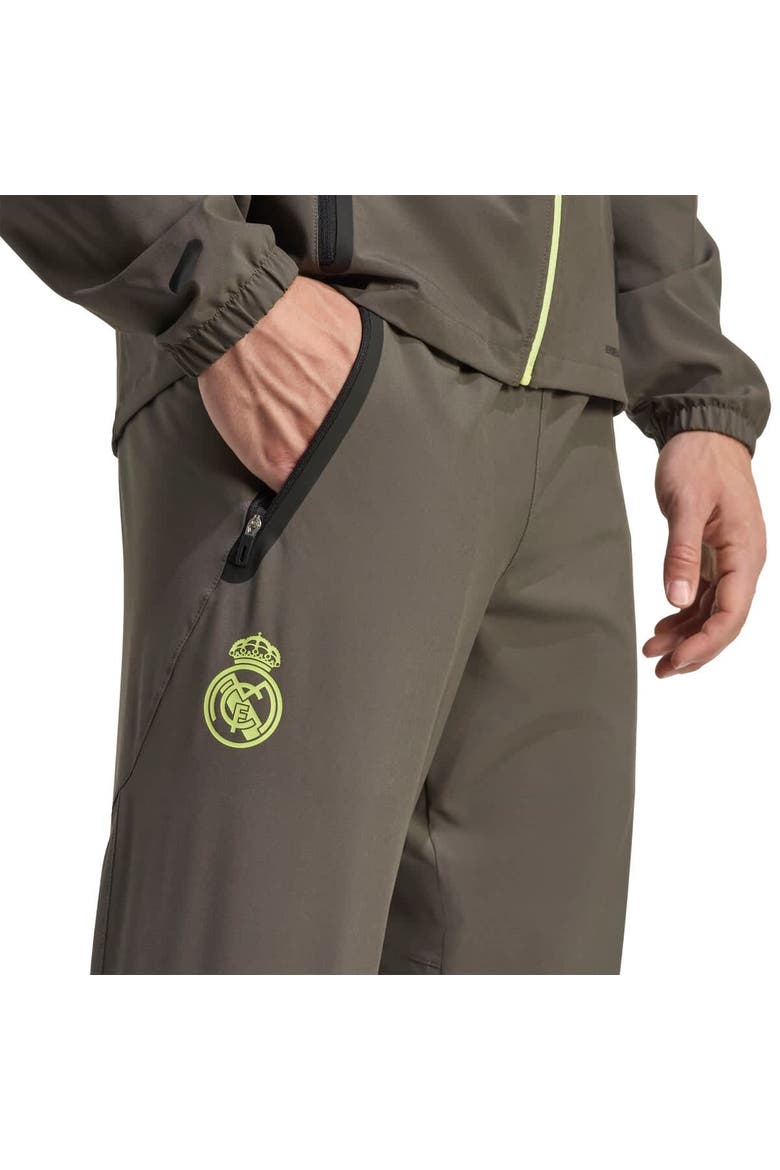 Men's adidas Olive Real Madrid 2025/26 Tiro Vis Tech Travel Pants, Alternate, color, Olive