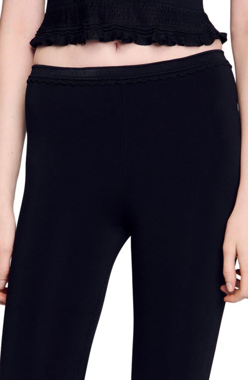 Sandro Ruffle-detailed Trousers In Black
