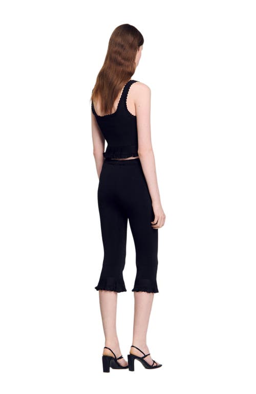 Sandro Ruffle-detailed Trousers In Black