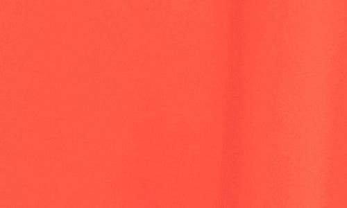Karen Kane Crossover Hem Asymmetric Top In Bright Orange