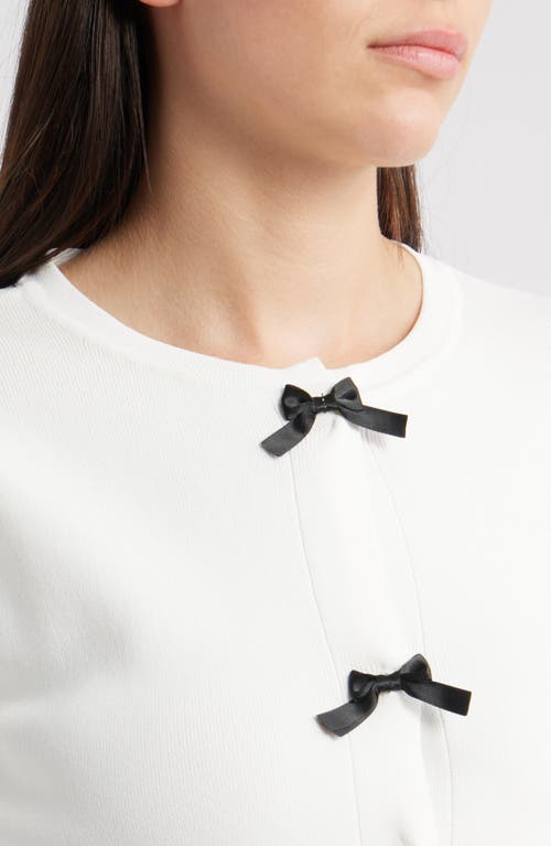 Zoe And Claire Short Sleeve Bow Cardigan In White