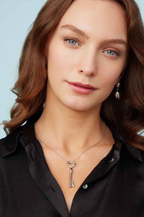 Oradina Sterling Silver Lover Statement Drop Earrings In Silver