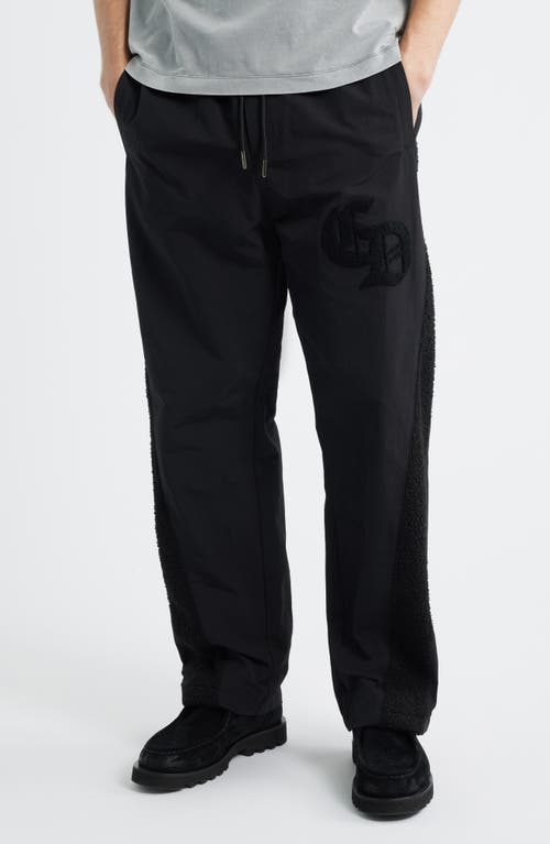 CRIMINAL DAMAGE Logo Appliqué Track Pants in Black 
