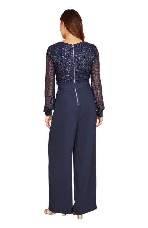 Yumi Long Sleeved Sequin Jumpsuit In Blue