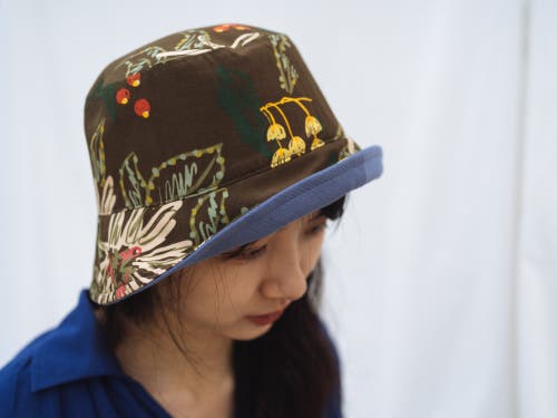 Lost Pattern Nyc "forest" Cotton Reversible Bucket Hat In Blue