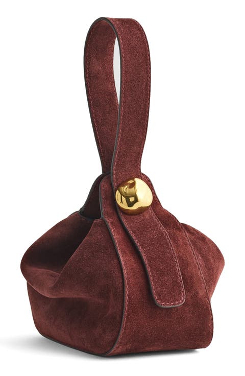 The Sculpted Metal Wristlet Suede Handbag
