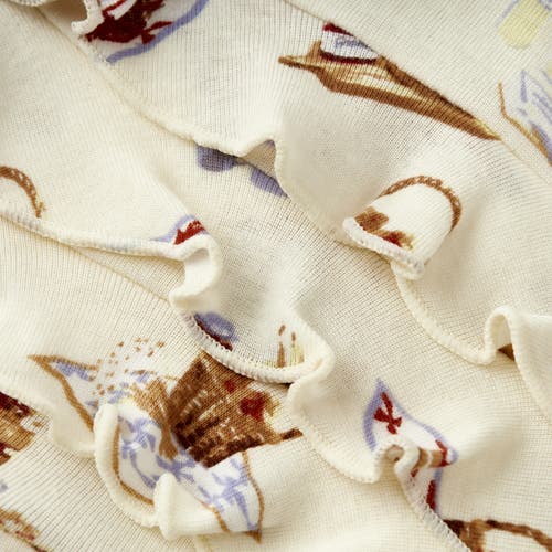 Milkbarn Organic Cotton Ruffle Footed Romper In Neutral