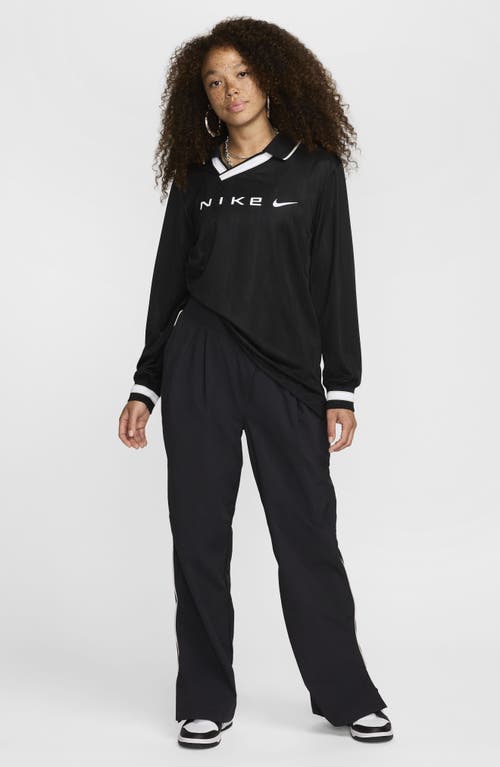 Nike Asymmetric Waist Water Repellent Pants In Animal Print