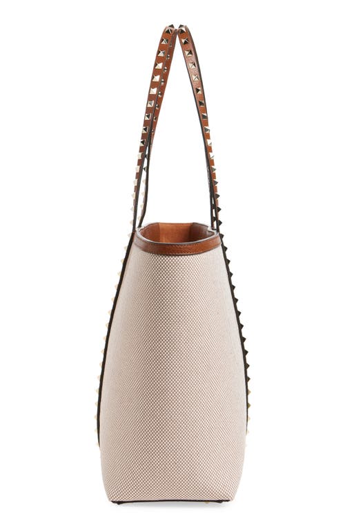 Shop Valentino Garavani Medium Rockstud Canvas Tote In Natural/tabacco