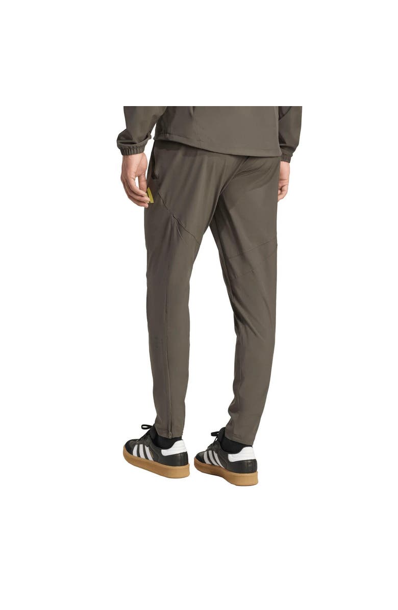 adidas Men's adidas Olive Real Madrid 2025/26 Tiro Vis Tech Travel Pants, Alternate, color, Olive