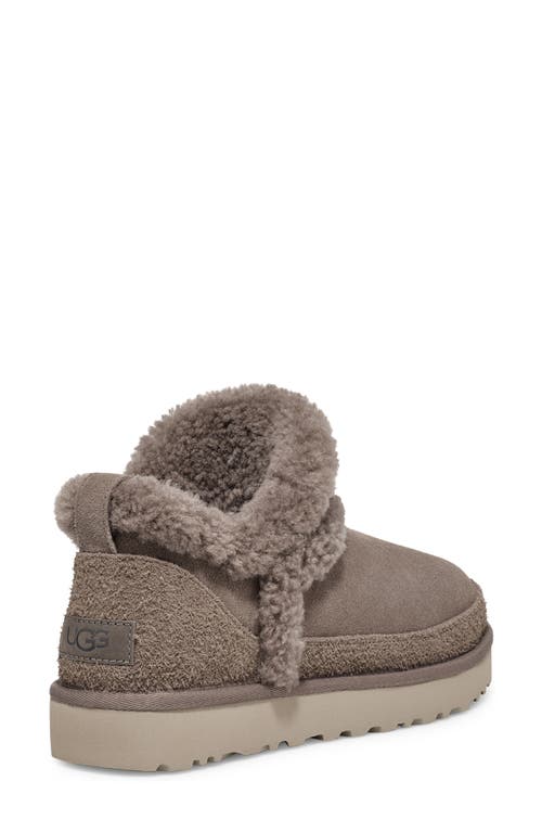 Ugg(r) Classic Ultra Mini Spillseam Genuine Shearling Bootie