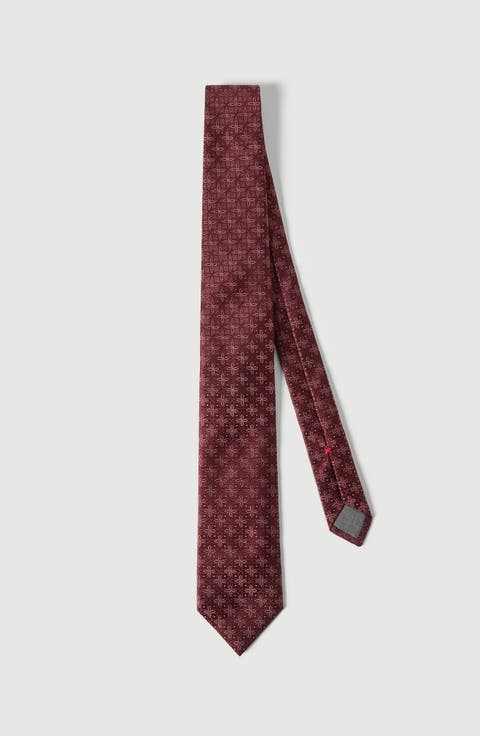 Silk tie with geometric floral pattern