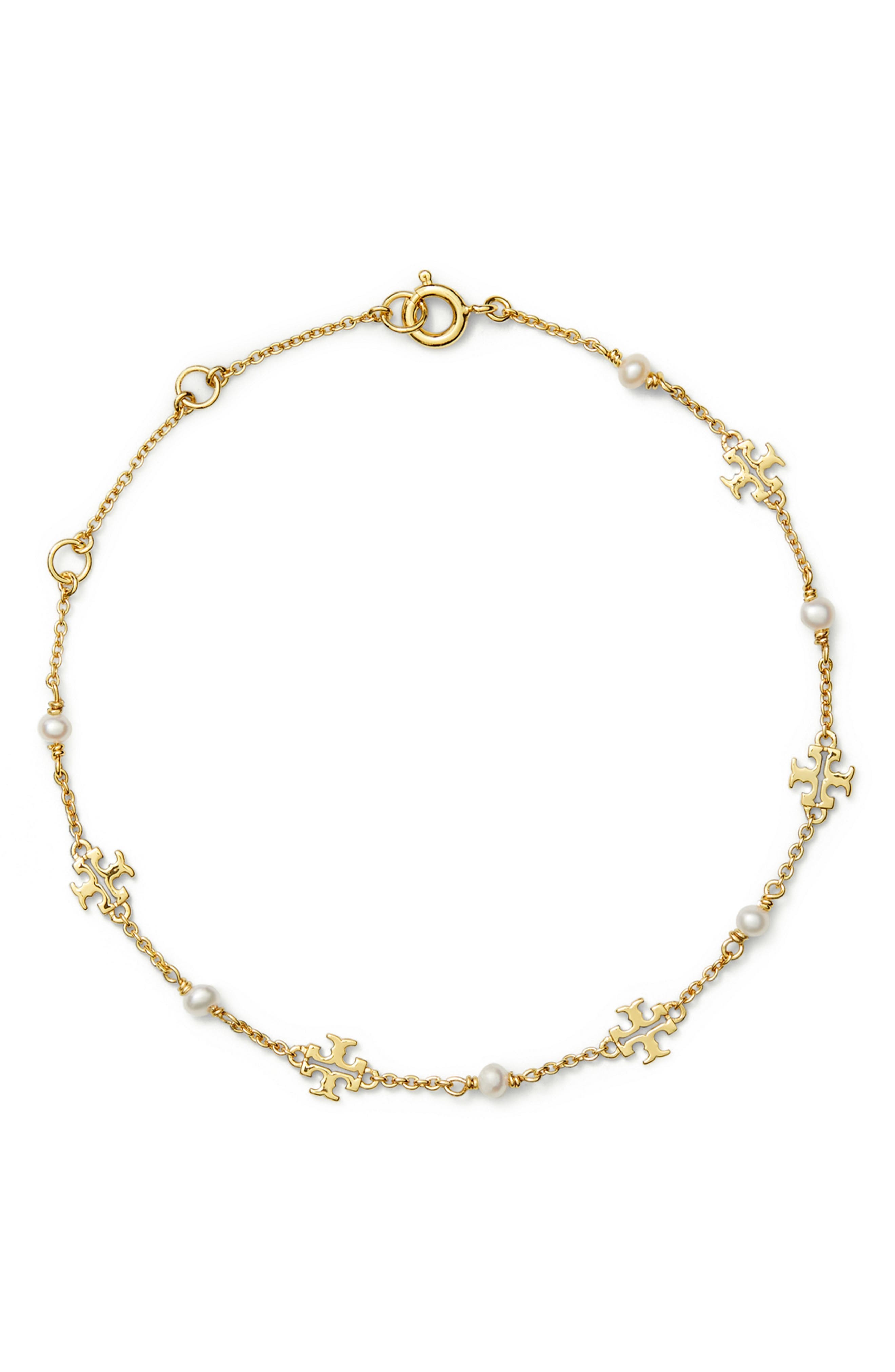 selected TORY GOLD / PEARL