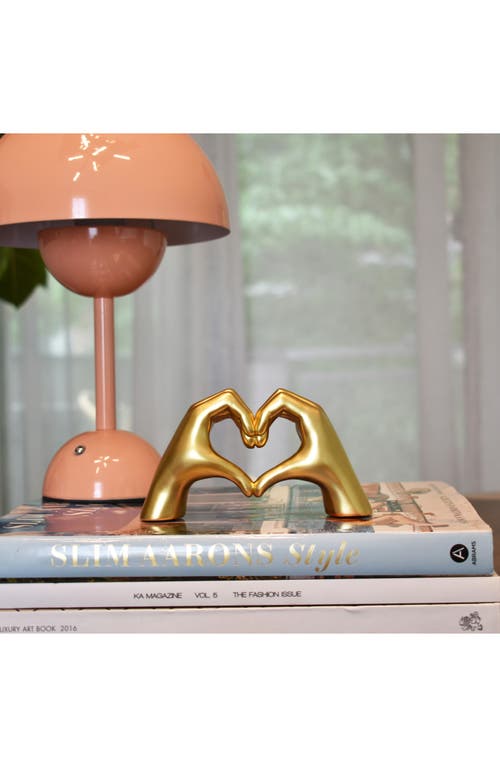 Shop Kinetic Heart Sign Hands Sculpture In Gold