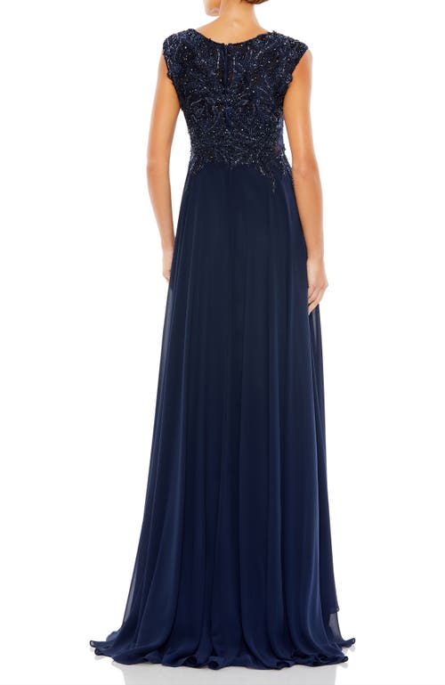 Mac Duggal Appliqued Cap Sleeve Bodice Flowy Gown In Navy