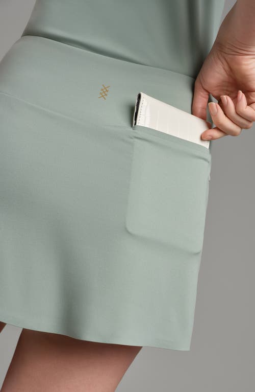 Rhone Course To Course Skort In Pacific Green