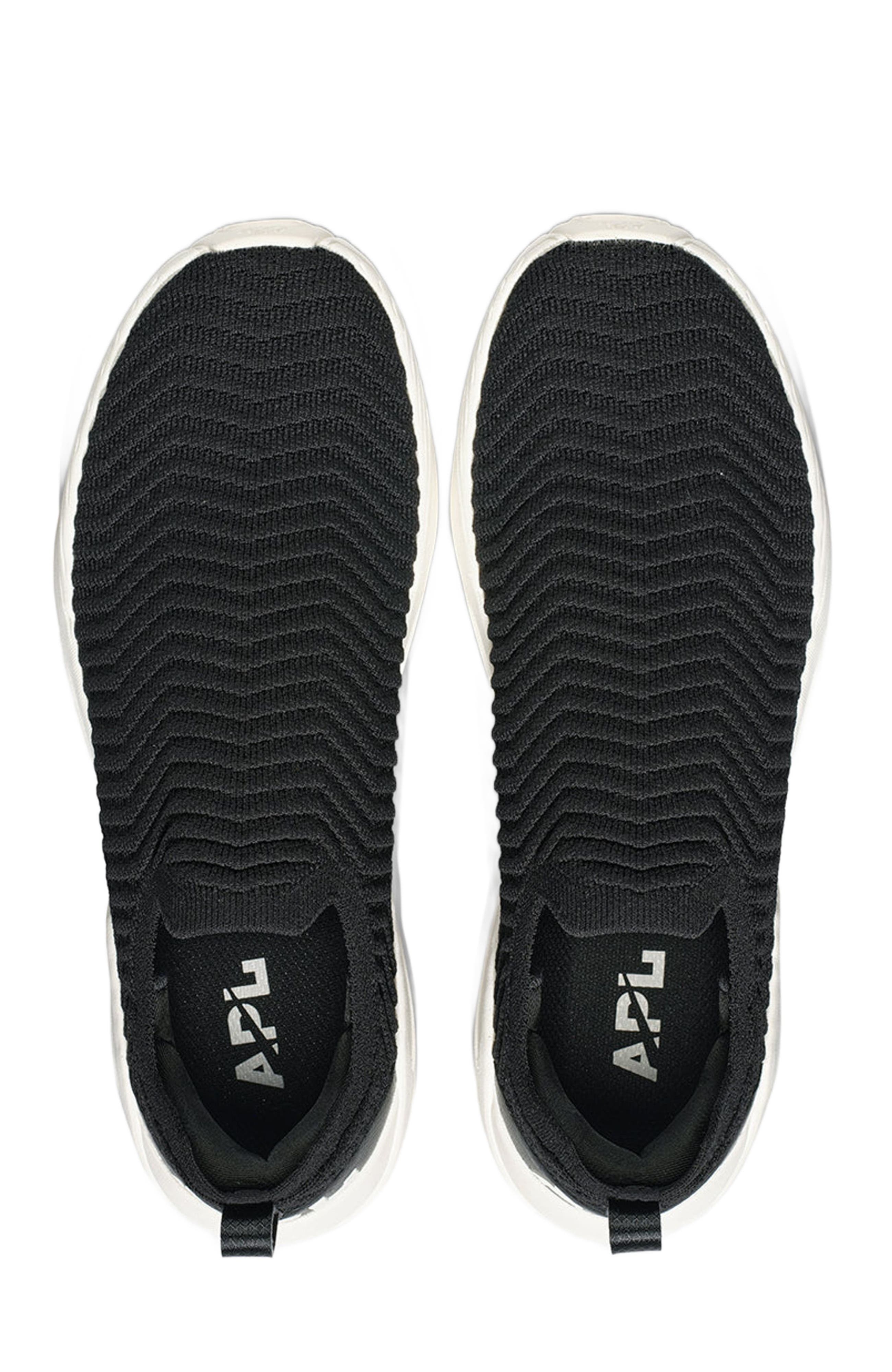 APL Men
S Techloom Traveler Slip-Ons, Alternate, color, Black / Ivory