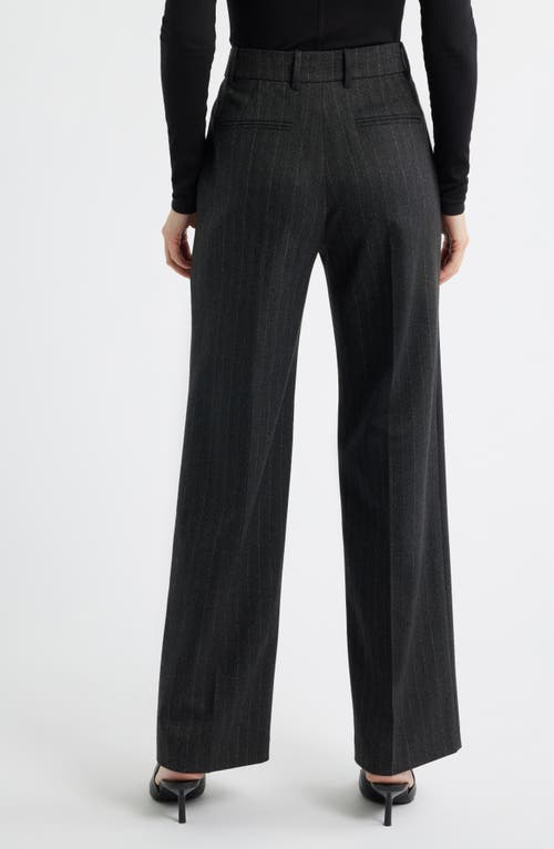Frame The Relaxed Pinstripe Straight Leg Trousers In Black
