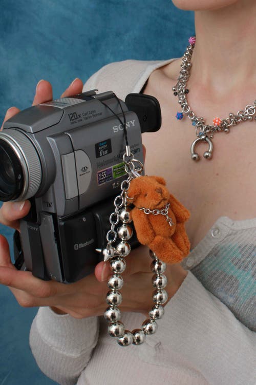 Velvet Luna Beaded Teddy Bear Phone Strap In Silver