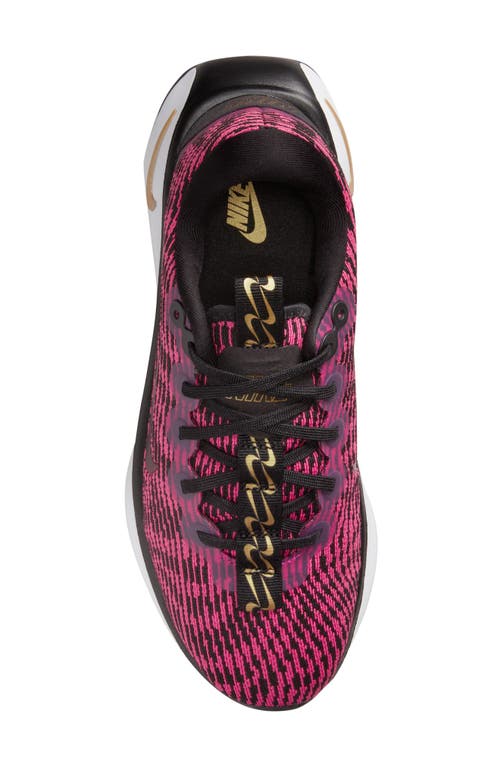 Nike Women's Motiva Walking Sneakers From Finish Line In Black/fireberry/gold