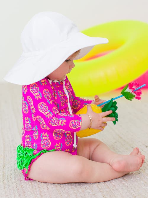 Rufflebutts Baby Girls Long Sleeve Upf50+ One Piece Rash Guard In Neon Violet Pineapples