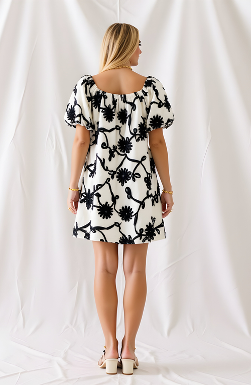 Modenaire Textured Floral Mini Dress With Puff Sleeves And Tie Neckline In Multi