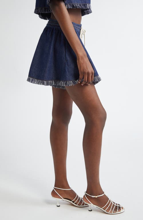Shop Zimmermann Rhiannon Drawstring Waist Fringe Hem Denim Shorts In Atlantic