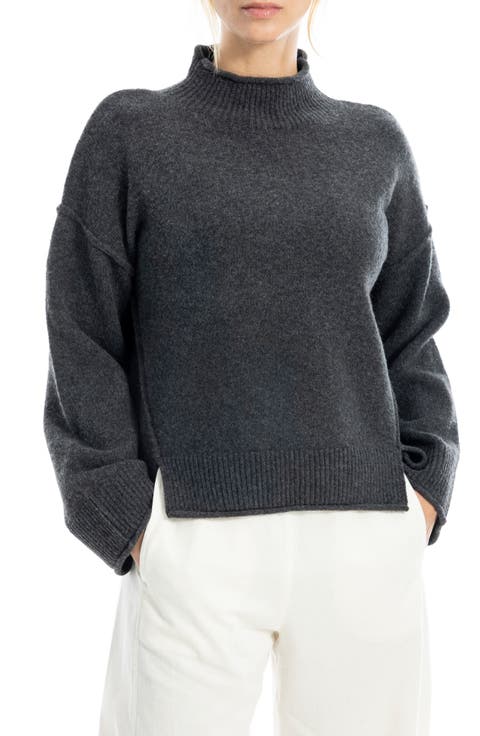 Exposed Seam Turtleneck Sweater