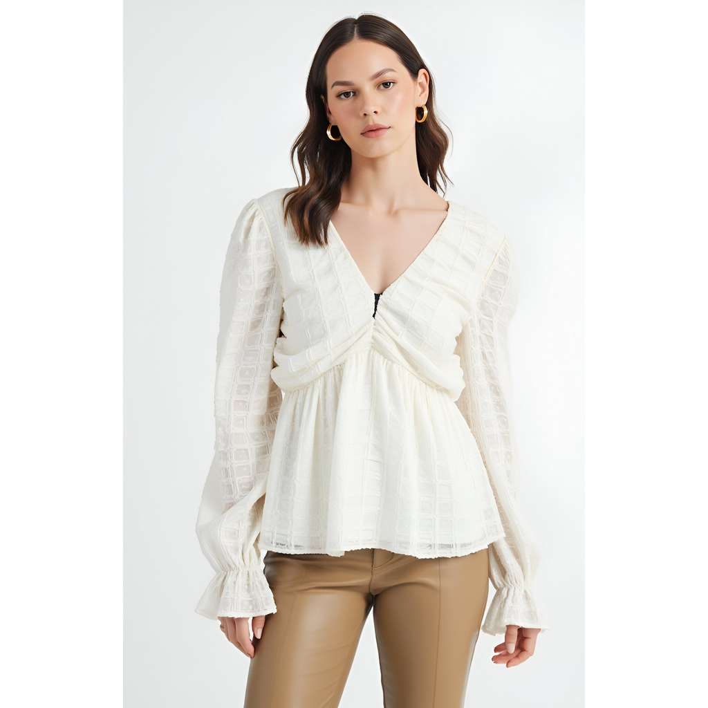 Modenaire Textured Long Sleeve Blouse With Peplum Hem And Back Bow Tie In White